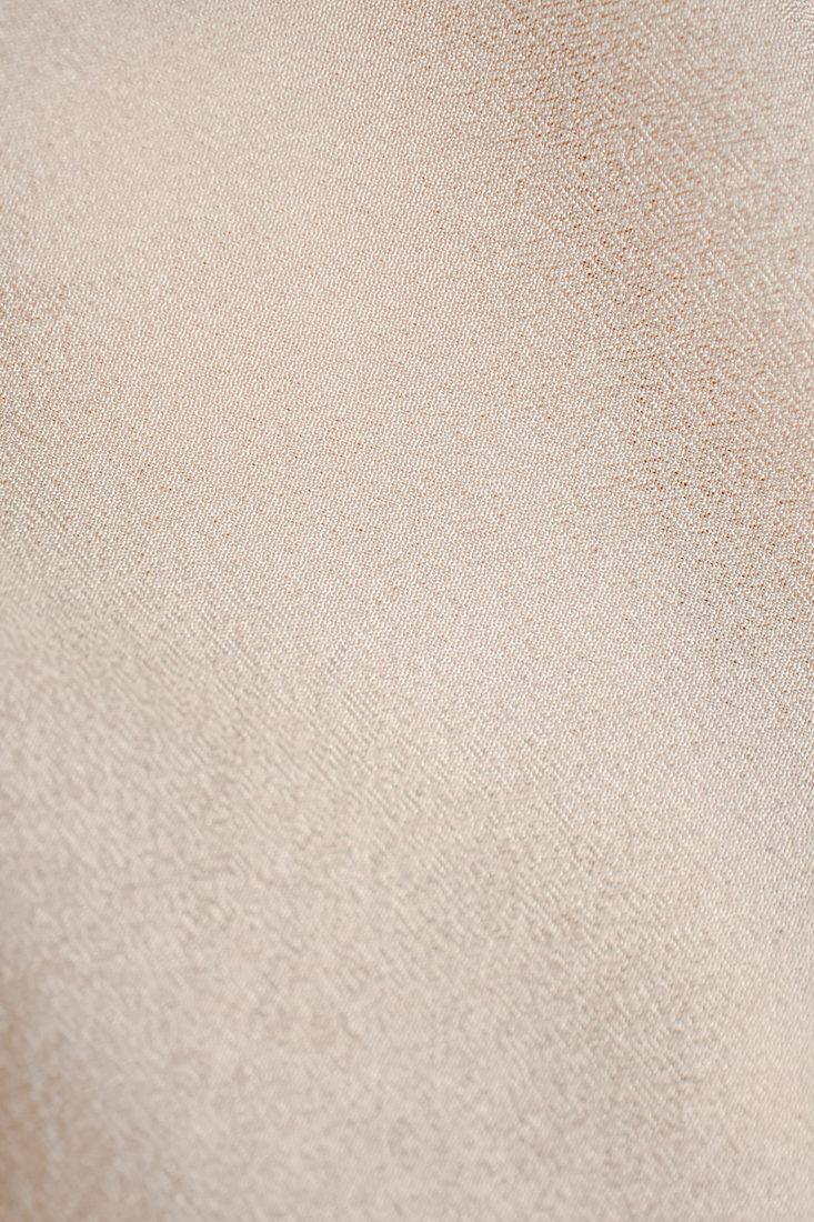 Close-up of finely woven natural linen fabric